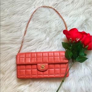 CHANEL gold and coral bag